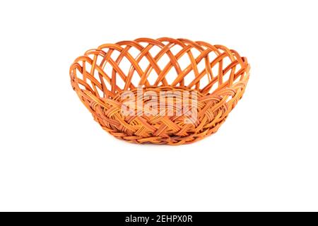 The empty wicker basket isolated on white background. Stock Photo