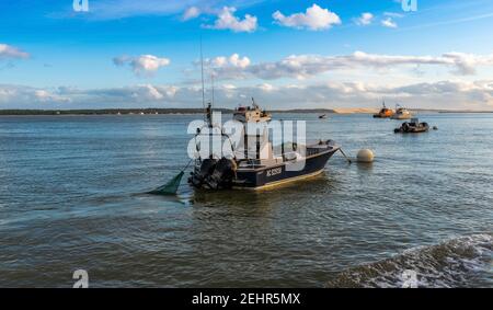 Boats in the Arcachon Basin in Gironde, Nouvelle-Aquitaine, France Stock Photo