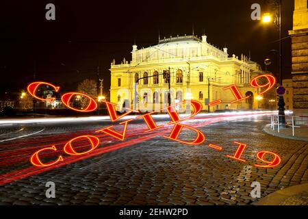 Coronavirus in Prague, Czech Republic.The building of Rudolfiunum concert halls on Jan Palach Square. Covid-19 sign. Concept of COVID pandemic and tra Stock Photo