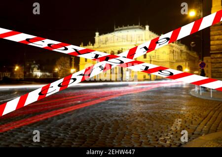 Coronavirus in Prague, Czech Republic.The building of Rudolfiunum concert halls on Jan Palach Square. Covid-19 sign on a blurred background. Concept o Stock Photo