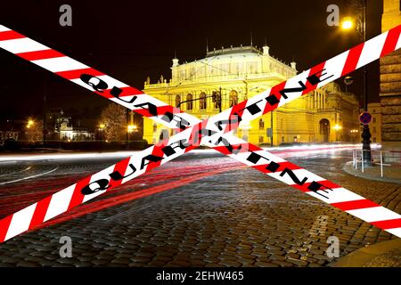 Coronavirus in Prague, Czech Republic. The building of Rudolfiunum concert halls on Jan Palach Square. Quarantine sign. Concept of COVID pandemic and Stock Photo