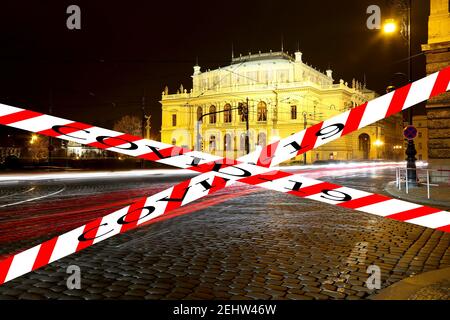 Coronavirus in Prague, Czech Republic.The building of Rudolfiunum concert halls on Jan Palach Square. Covid-19 sign. Concept of COVID pandemic and tra Stock Photo