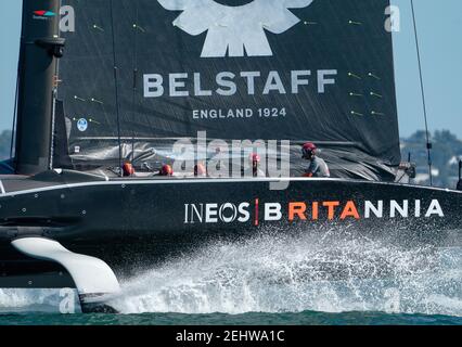 Auckland, New Zealand, 20 February, 2021 -  INEOS Team UK's Britannia, skippered by Sir Ben Ainslie (right), in action against Luna Rossa Prada Pirelli during their fifth race in the Prada Cup Finals on Auckland's Waitemata Harbour. Credit: Rob Taggart/Alamy Live News Stock Photo