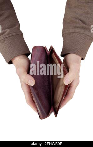 An elderly woman holds an empty wallet, or purse isolated on white background. The concept of poverty in retirement. Global Extreme poverty.No money . Stock Photo