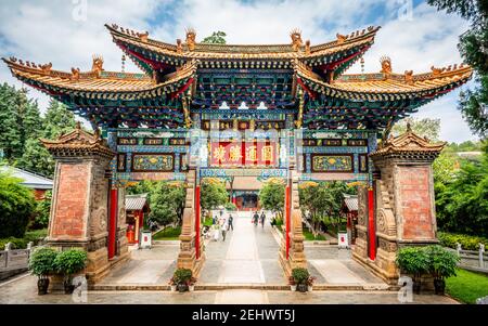 Kunming China , 11 October 2020 : View of Yuantong Buddhist temple main entrance archway with people in Kunming Yunnan China Stock Photo