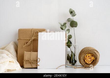 Fashion stock stationery background on a white background. blank postcard for lettering and gifts in kraft paper. Wedding background. Invitation card. Stock Photo