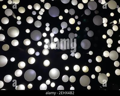 Ceiling multi-colored lamps lighting in the dark - Photo Stock Photo