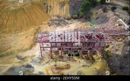 Tailings from mining and old rusty machinery, aerial view Stock Photo