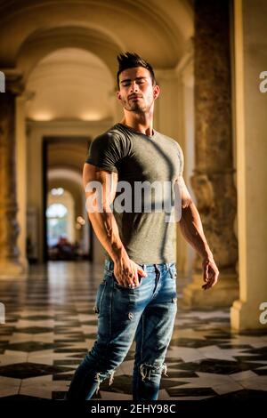 Handsome Man Looking Around Inside a Museum Stock Photo