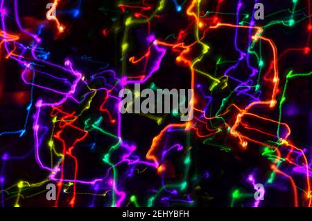 Multi-colored explosion of lights on dark background Stock Photo