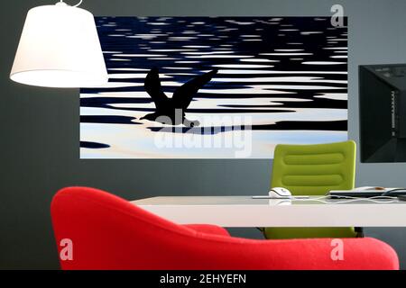 A Modern Minimalistic House Interior With a Photograph of a Seagull and the Rippled Sea on the Wall Stock Photo