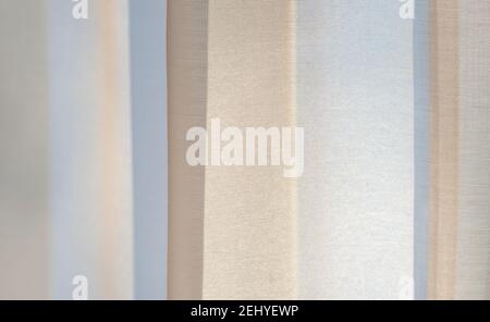 Soft color fabric background with vertical brown and blue stripes. Abstract textile. Stock Photo