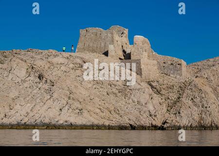 Old stone Fortress Fortica on A Rocky Cliff of Island Pag Stock Photo