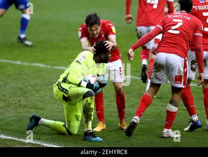 Nottingham Forest's Yuri Ribeiro (centre) celebrates with goalkeeper Brice Samba after he saves a penalty from Blackburn Rovers' Adam Armstrong (not pictured) during the Sky Bet Championship match at the City Ground, Nottingham. Picture date: Saturday February 20, 2021. Stock Photo