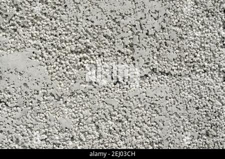 Abstract pattern on the surface of the briquette made of foamed concrete as a background. The cellular texture of the concrete. Stock Photo
