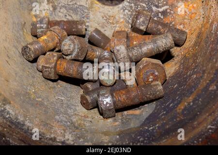 old rusty bolt and nut, pile of bolts, pile of rusty bolts Stock Photo