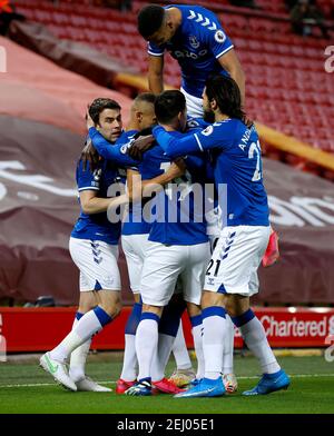 Everton's Richarlison (second left) celebrates with his team-mates after scoring their side's first goal of the game during the Premier League match at Anfield, Liverpool. Picture date: Saturday February 20, 2021. Stock Photo