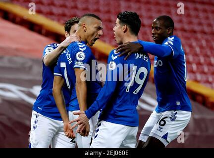 Everton's Richarlison (second left) celebrates with his team-mates after scoring their side's first goal of the game during the Premier League match at Anfield, Liverpool. Picture date: Saturday February 20, 2021. Stock Photo