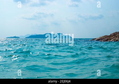 Beautiful sparkling clear sea in a Tropical country. Leisure and sea travel. Stock Photo