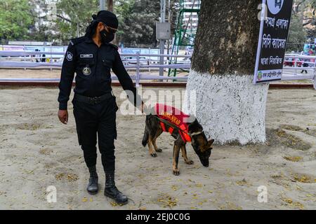 RAB dog squad inspect in front of Central Shaheed Minar in the capital as part of stepped-up security measures ahead of International Mother Language Day and Shaheed Dibosh in Dhaka, Bangladesh on February 18, 2021. Stock Photo