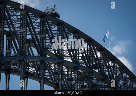 The Australian National Flag flies on top of the Sydney Harbour Bridge, Sydney, New South Wales, Australia. Stock Photo