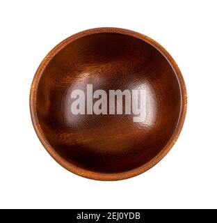 Top view of brown wooden bowl isolated on white background. Empty dishes for food design. Beautiful eco-friendly tableware made of natural wood. Stock Photo