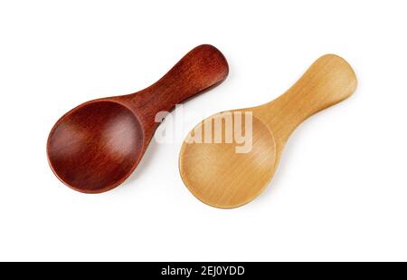 Pair of small wooden spoons for tea or shugar isolated on white background. Dark and light empty spoons for food design. Eco-friendly tableware. Stock Photo