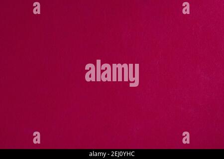 High resolution close up of bright red felt fabric. red felt texture. Stock Photo