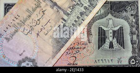 Egyptian 50 piasters banknotes collection, half a pound Egyptian money currency close up. an old banknote versus an older one Stock Photo