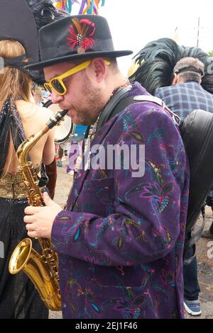 Sax player in French Quarter on Mardi Gras. Stock Photo
