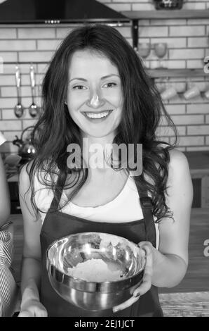 Woman baking powder nose cooking pie cake cookies, bakery concept. Stock Photo