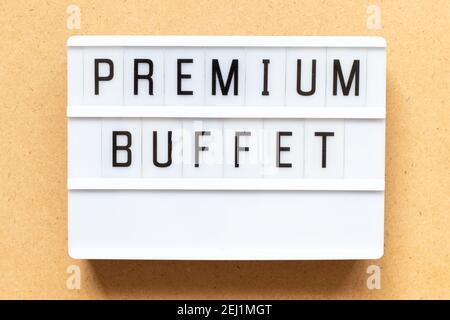 Lightbox with word premium buffet on wood background Stock Photo