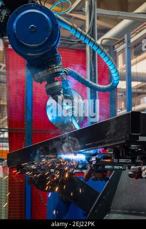 Welding robot in the process. Modern welding production Stock Photo