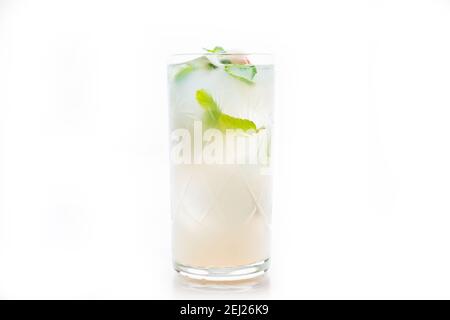 Fresh lychee mojito isolated on white. Selective focus. Shallow depth of field. Stock Photo