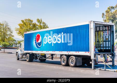 Oct 5, 2020 Sunnyvale / CA / USA - Pepsi truck making deliveries in South San Francisco Bay Area; PepsiCo, Inc. is an American multinational food, sna Stock Photo