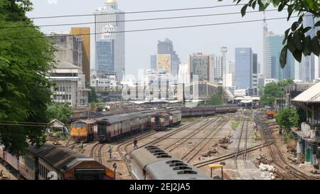 BANGKOK, THAILAND - 11 JULY, 2019: View of the train station against the backdrop of the cityscape and skyscrapers. Hua Lamphong is the hub of public Stock Photo