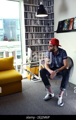 bearded young man in London loft Stock Photo