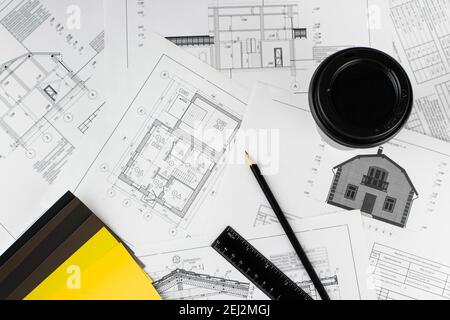 Engineering And Architectural Drawings. Architect workplace top view. Part of architectural project. Construction concept. Engineering tools. Copy spa Stock Photo