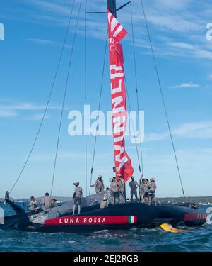 Auckland, New Zealand, 21 February, 2021 -  Italian team Luna Rossa Prada Pirelli celebrate their Prada Cup Finals 7-1 win over INEOS Team UK's Britannia on Auckland's Waitemata Harbour. Luna Rossa will go forward to challenge Emirates Team New Zealand in the 36th America;s Cup starting on March 6.  Credit: Rob Taggart/Alamy Live News Stock Photo