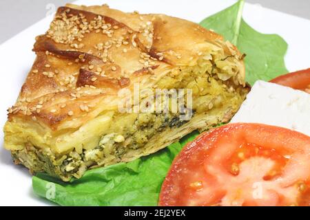 Traditional greek spinach pie ( spanakopita ) with goat cheese Stock Photo