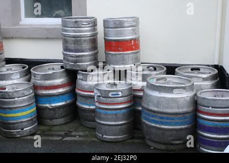 Metal beer barrels outside delivery on a path Stock Photo