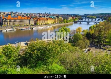 Breathtaking view from the hill with colorful old buildings on the waterfront and spectacular bridges over the Vltava river, Prague, Czech Republic, E Stock Photo