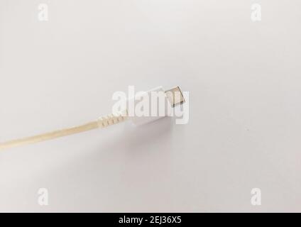 A closeup of micro USB cable on white background Stock Photo