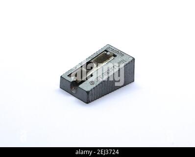 Photo of a Used and old Staedtler graphite metal pencil sharpener against a white background Stock Photo