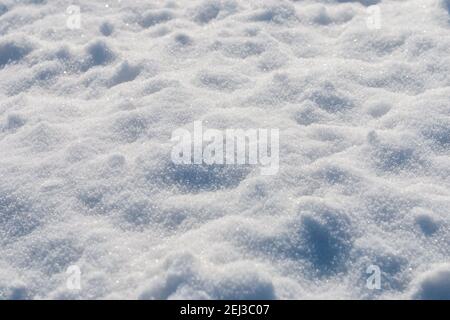 Fresh snow with lights and shadows, closeup Stock Photo