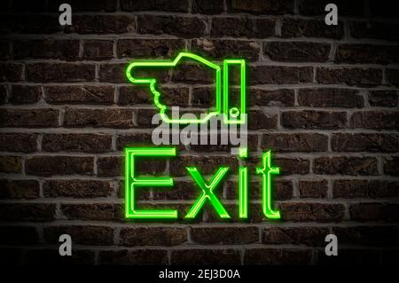 Detail photo of a neon sign on a wall with the inscription Exit Stock Photo