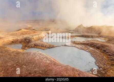 Steam pool in Sol de Manana at sunrise. Geothermal area in Bolivia, South America Stock Photo