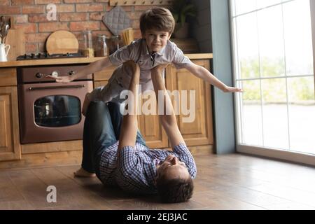 child pretending to be strong man Stock Photo - Alamy