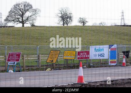 Chalfont St Giles, UK. 20th February, 2021. A temporary haul road is being prepared alongside Bottom House Farm Lane for use in the construction of a ventilation shaft for the Chiltern Tunnel on the HS2 high-speed rail link. Credit: Mark Kerrison/Alamy Live News Stock Photo