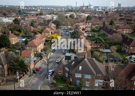 Aerall view of housing in Acton, a West London sprawling suburb. Featuring numerous semi-detached houses with gardens. Stock Photo